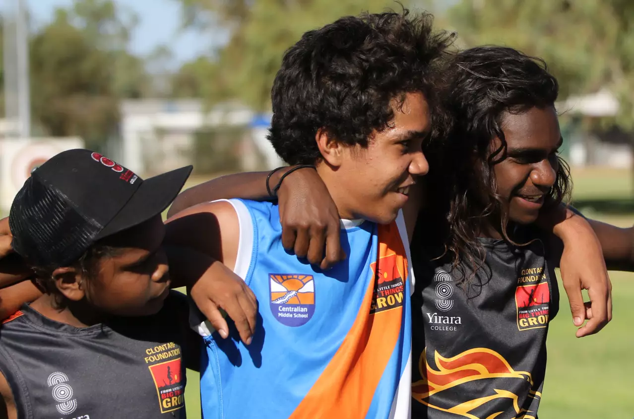 Aboriginal youth in sports team representing Indigenous community engagement
